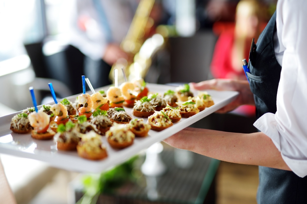 Woman serving appetizers