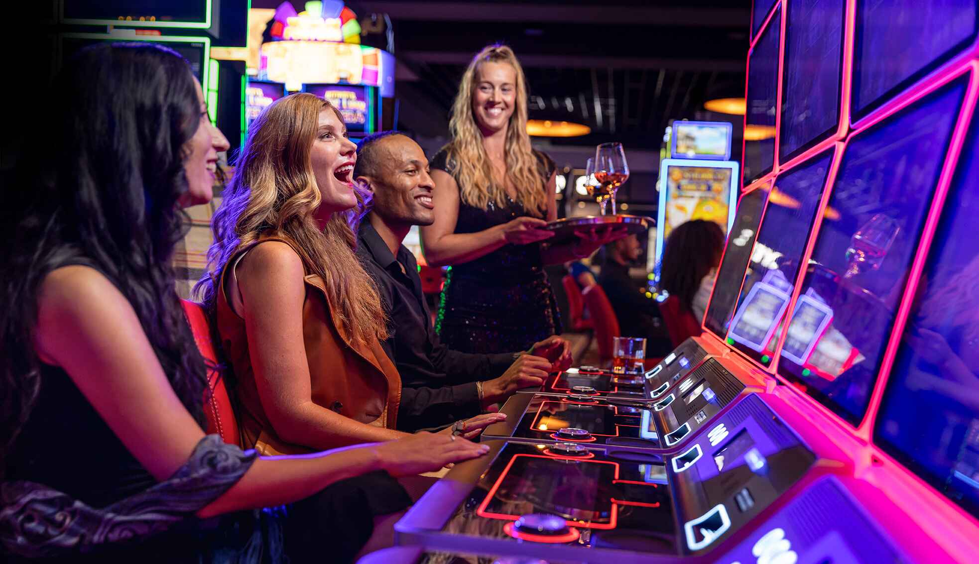 Friends playing games at The Rose Gaming Resort
